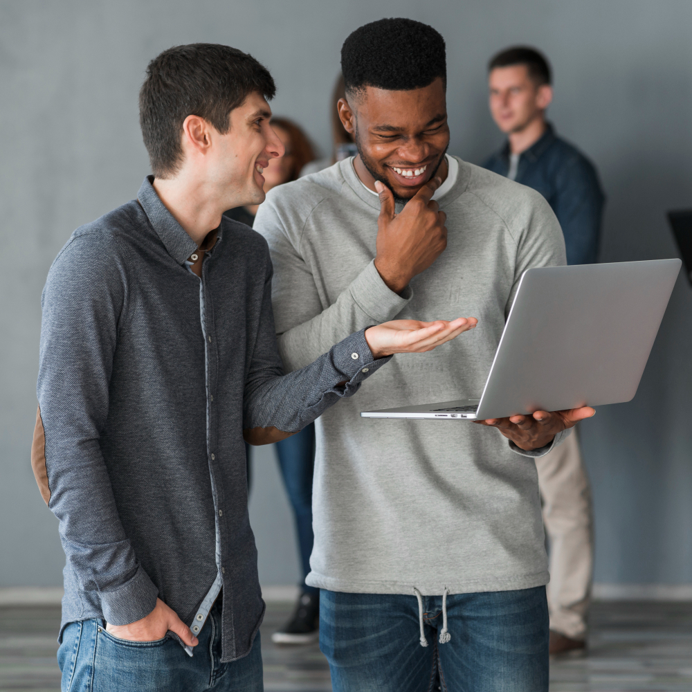 guy holding a laptop